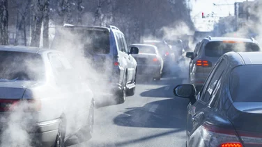 cars on road with pollution