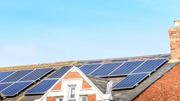 Solar panels on a UK roof on a sunny day