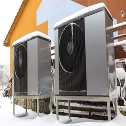 heat pumps by a house