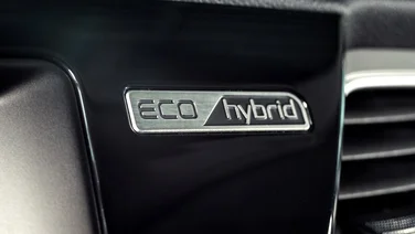 Close-up of eco hybrid label inside car