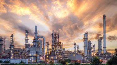 gas refinery with sunrise