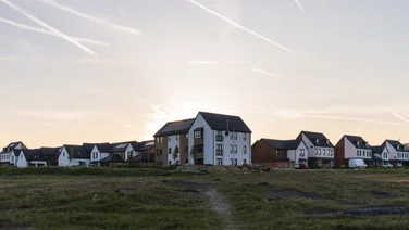 solar panels on houses in the Waverley residential estate near Sheffield, at sunset