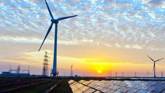 Solar panels and wind turbines.