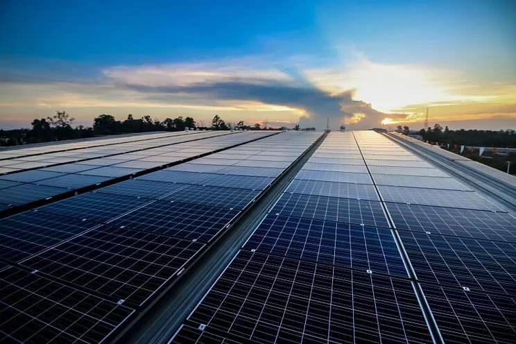 Large solar panel system installed on the roof of a commercial building