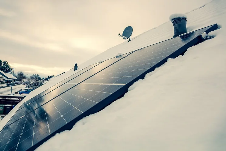 Solar panel system in snowy weather, the snow has been removed from the solar panels