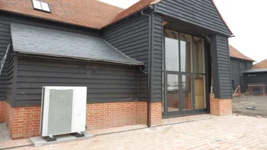 Heat pump outside a house.