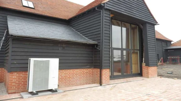 Heat pump outside a house.