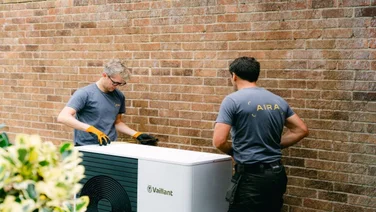 Heat pump being installed.