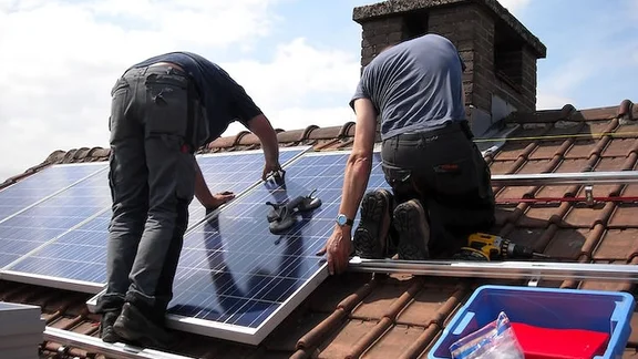 Solar panels being installed.