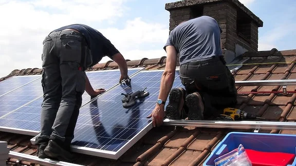 Solar panels being installed.