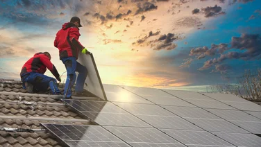 Solar panels being installed on a roof