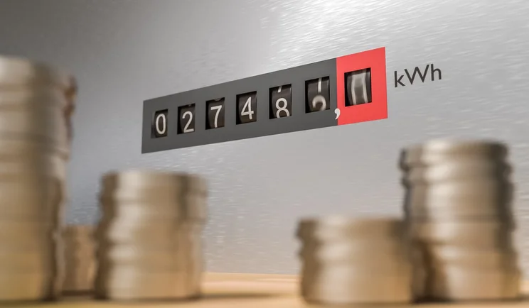 Money in front of a gas meter