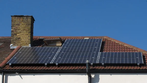 Solar panels installed on a roof on a house in Ealing.